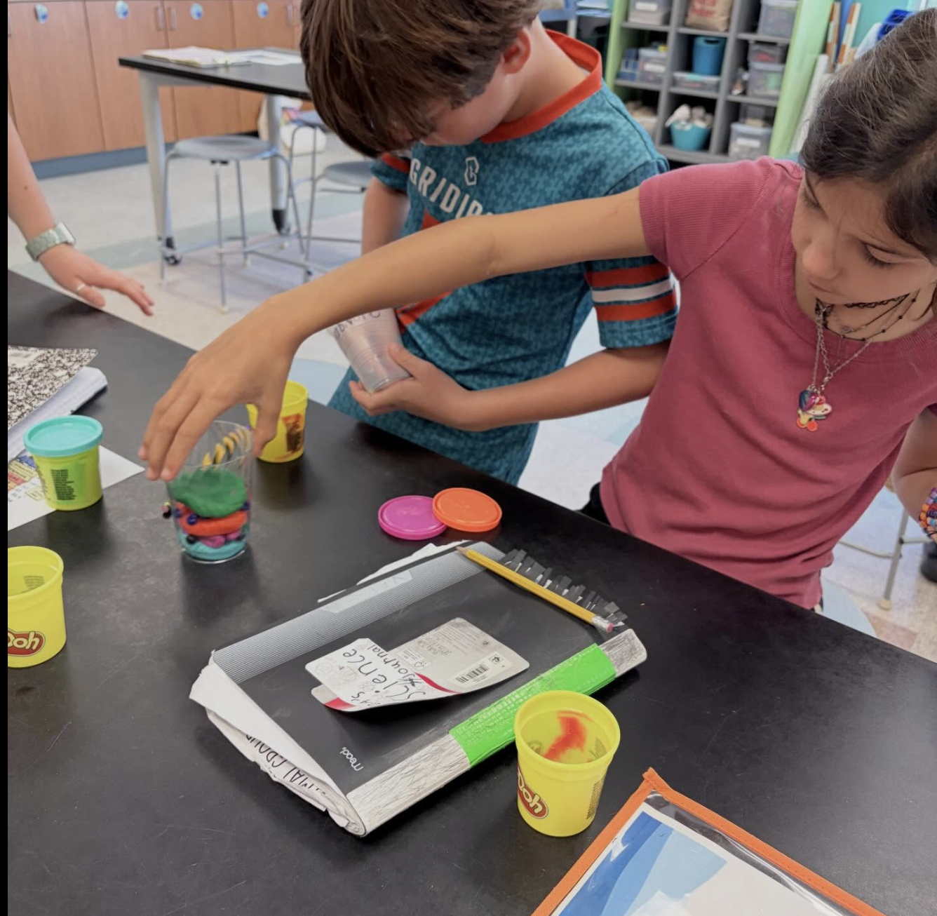 kids making art with playdoh